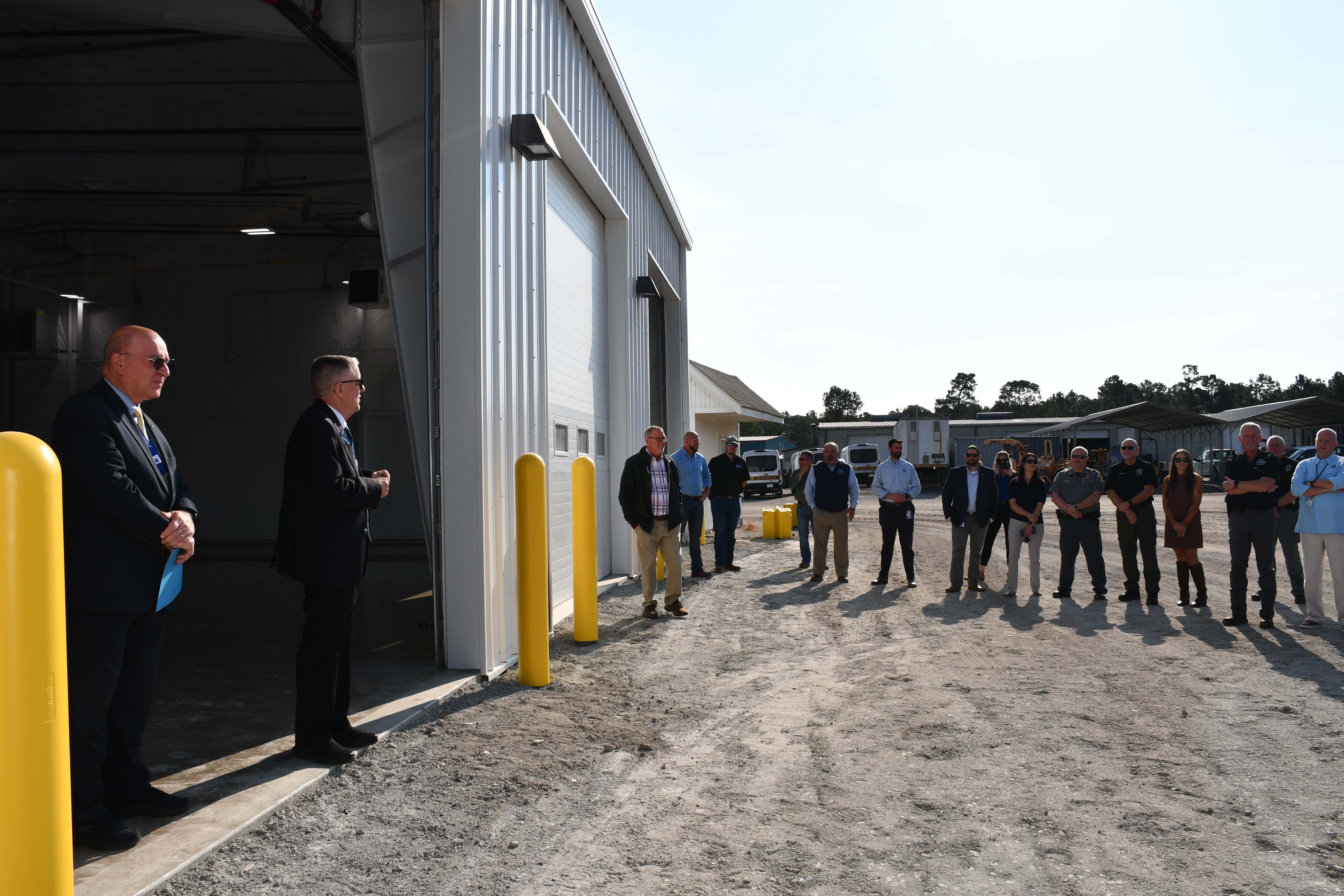 Horry County Council Chairman speaks to employees during ribbon cutting